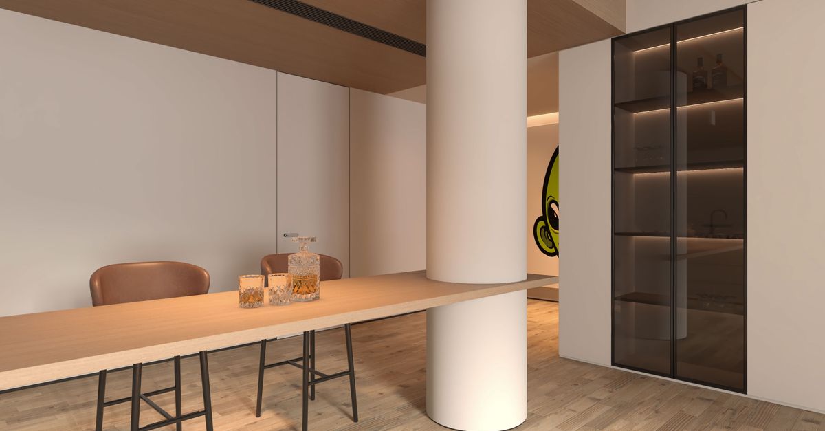 Detalle de la estructura metálica de un escritorio con columna regulable